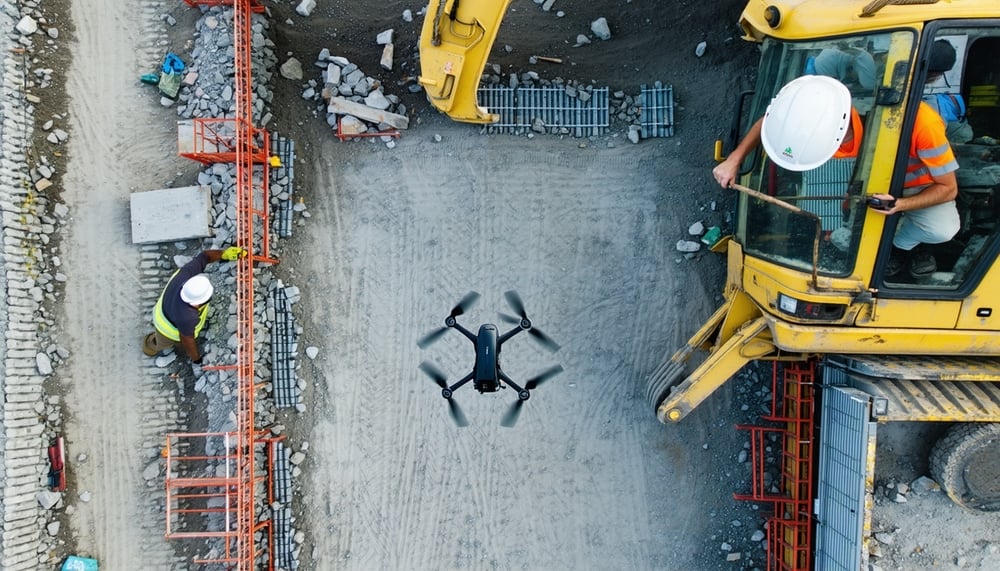 A drone capturing aerial footage over a construction site A drone capturing aerial footage over a construction site