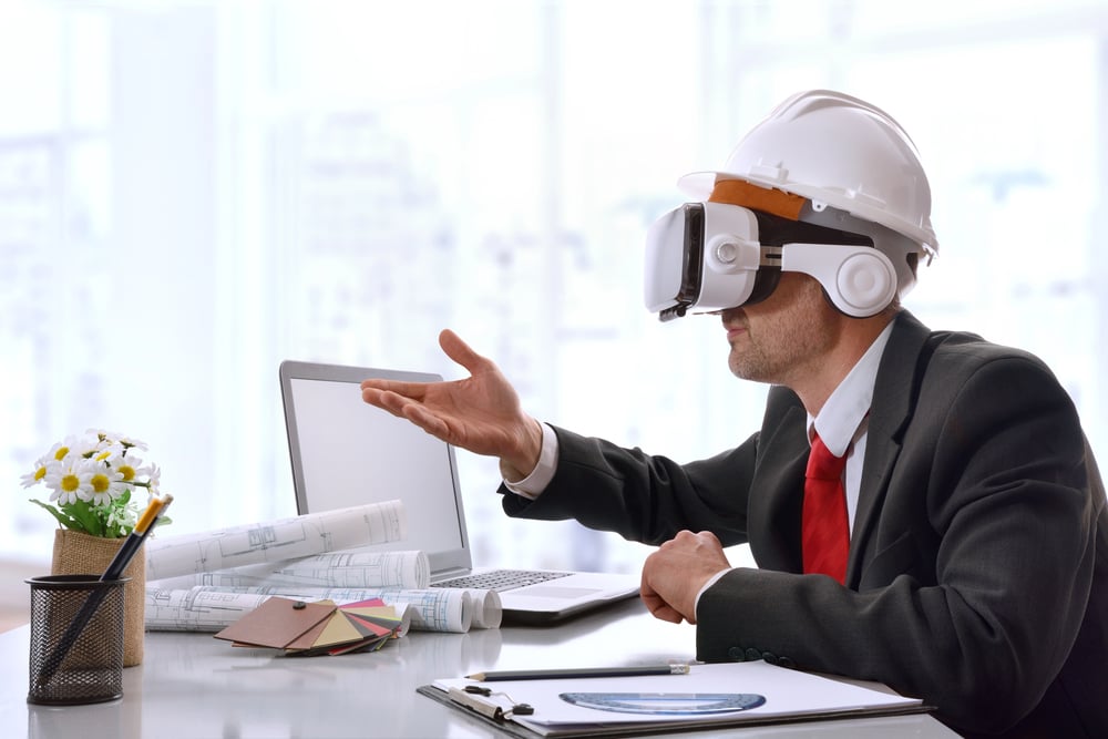 business_executive_watching_a_Virtual_Tour_of_a_worksite